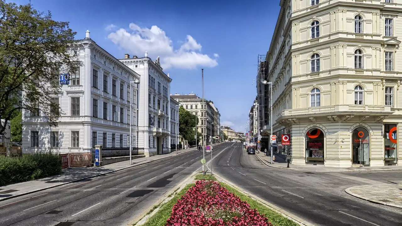 Qual é a cidade da Áustria famosa por suas academias de música?