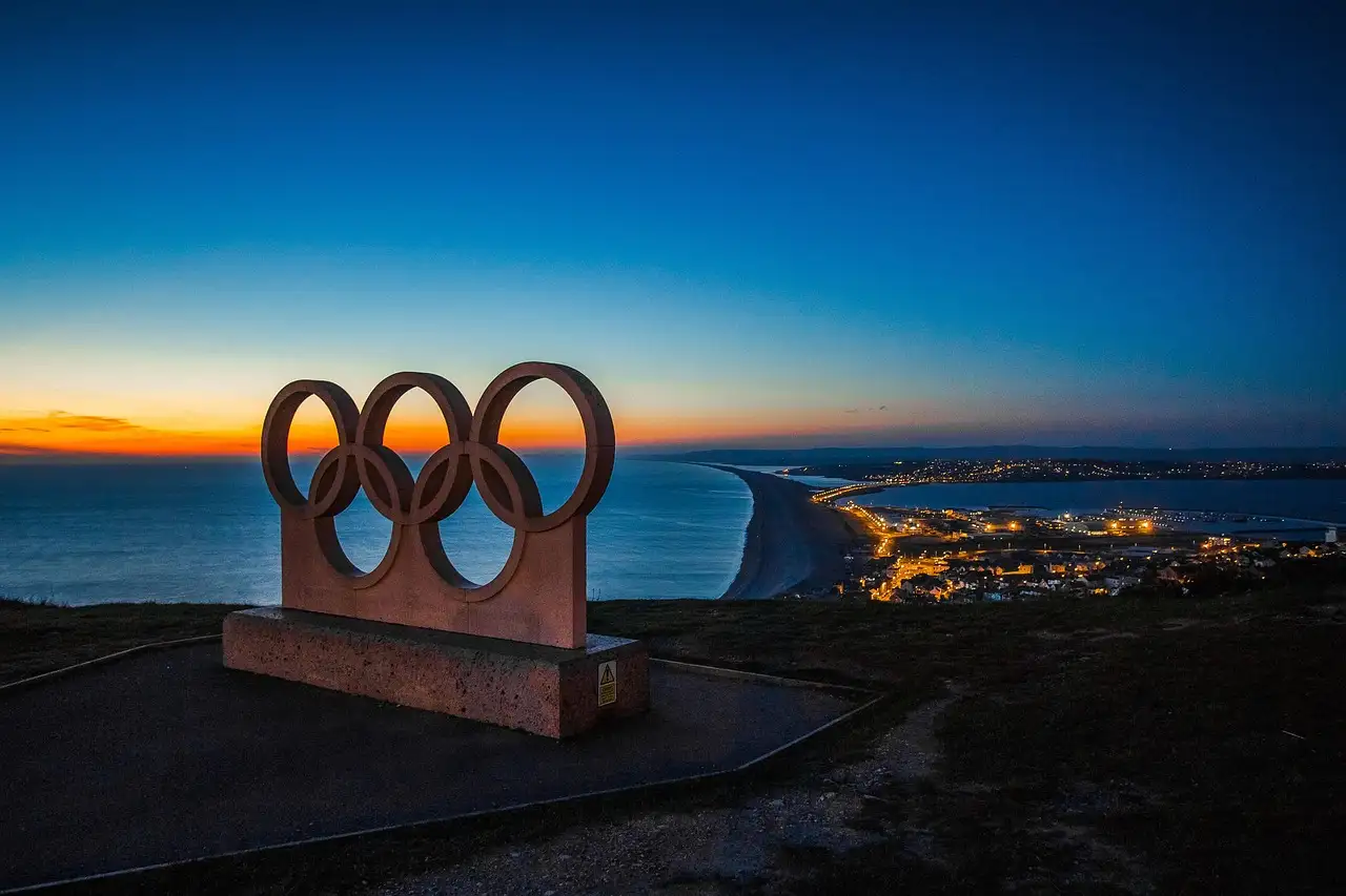 Como a função do atletismo nos Jogos Olímpicos mudou ao longo do tempo?